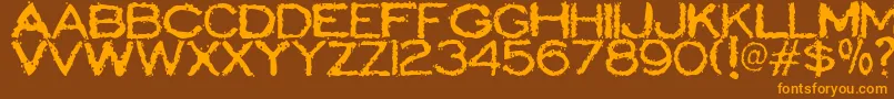 ScatterbrainedRestrained Font – Orange Fonts on Brown Background
