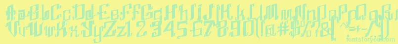 AbhinayaRegular Font – Green Fonts on Yellow Background