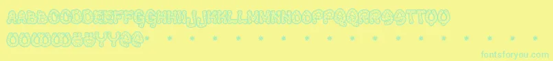 Raveq-Schriftart – Grüne Schriften auf gelbem Hintergrund