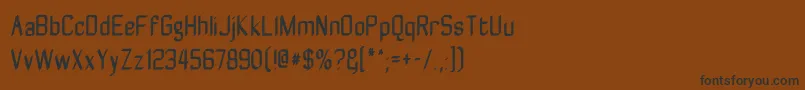 Zyphytecondense Font – Black Fonts on Brown Background