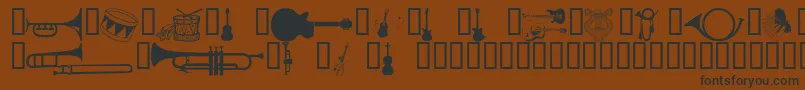 Wmmusic1-Schriftart – Schwarze Schriften auf braunem Hintergrund