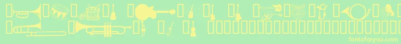 Wmmusic1 Font – Yellow Fonts on Green Background