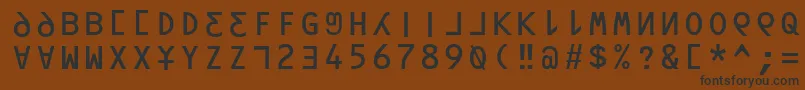 フォントOrav – 黒い文字が茶色の背景にあります