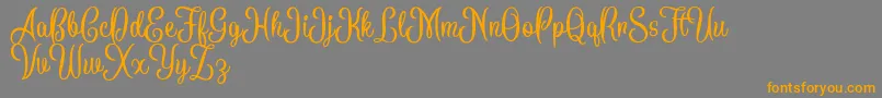 BattallionScriptDemo Font – Orange Fonts on Gray Background