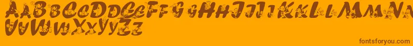 Everylettertellsastory-Schriftart – Braune Schriften auf orangefarbenem Hintergrund