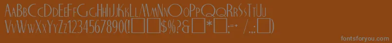NicholasRegular-fontti – harmaat kirjasimet ruskealla taustalla