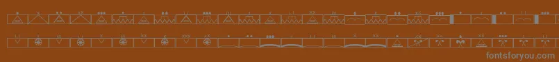 Czcionka EsriMilsym02 – szare czcionki na brązowym tle