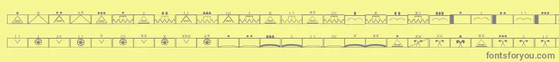 Fonte EsriMilsym02 – fontes cinzas em um fundo amarelo