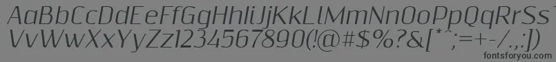 Шрифт Resagnictoitalic – чёрные шрифты на сером фоне