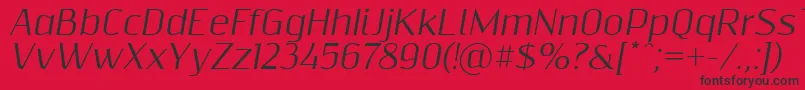 Шрифт Resagnictoitalic – чёрные шрифты на красном фоне