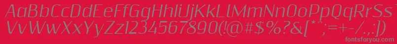 フォントResagnictoitalic – 赤い背景に灰色の文字