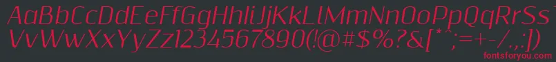 Czcionka Resagnictoitalic – czerwone czcionki na czarnym tle