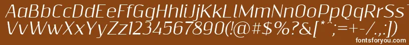 Шрифт Resagnictoitalic – белые шрифты на коричневом фоне