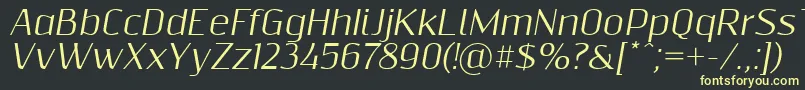 フォントResagnictoitalic – 黒い背景に黄色の文字
