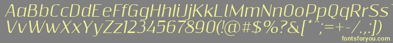 Resagnictoitalic Font – Yellow Fonts on Gray Background