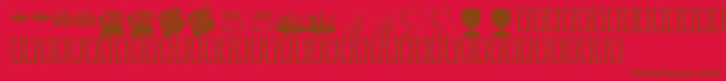 KrHappyKwanza-Schriftart – Braune Schriften auf rotem Hintergrund