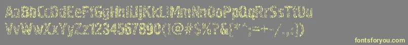 Pollock4c-Schriftart – Gelbe Schriften auf grauem Hintergrund