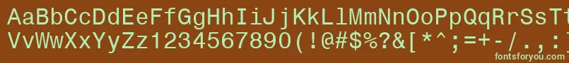 フォントMonospace821Bt – 緑色の文字が茶色の背景にあります。