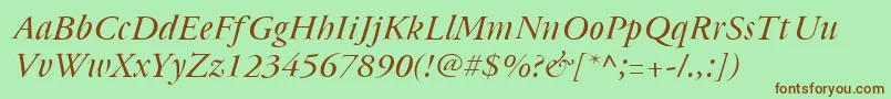 Czcionka Cyrillicgaramond Italic – brązowe czcionki na zielonym tle
