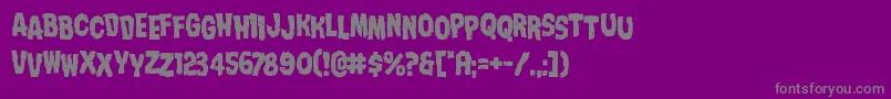 フォントNightmarealleystag – 紫の背景に灰色の文字