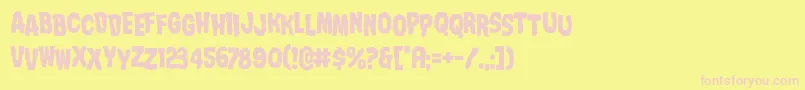 Nightmarealleystag-fontti – vaaleanpunaiset fontit keltaisella taustalla