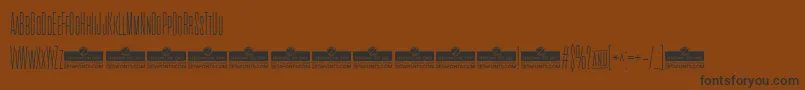 CinematograficaThinTrial Font – Black Fonts on Brown Background