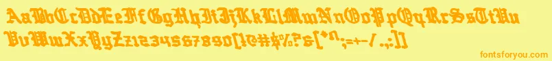 Questknightl-Schriftart – Orangefarbene Schriften auf gelbem Hintergrund