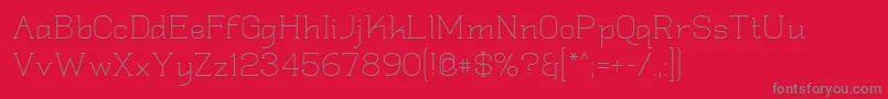 Quadlate Font – Gray Fonts on Red Background