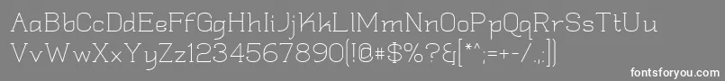 フォントQuadlate – 灰色の背景に白い文字