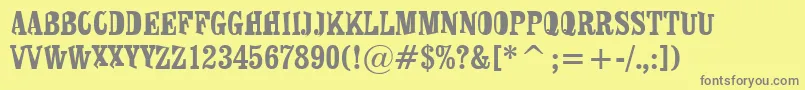 Lisätietoja Shirt-fontista Shirt-fontti – harmaat kirjasimet keltaisella taustalla