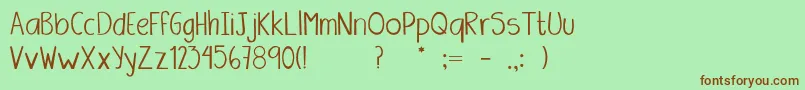 Amanda Font – Brown Fonts on Green Background