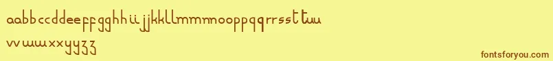 Fonte Minusculeregular – fontes marrons em um fundo amarelo