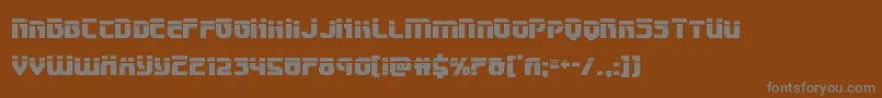 Speedwagonlaser-Schriftart – Graue Schriften auf braunem Hintergrund