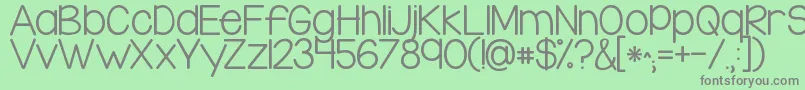 フォントKglegohouse – 緑の背景に灰色の文字