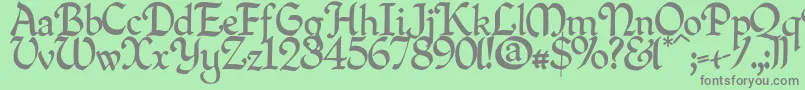 フォントQuillpn – 緑の背景に灰色の文字