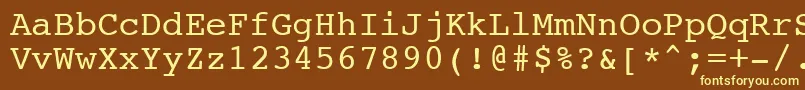 NtcouriervkNormaloblique-fontti – keltaiset fontit ruskealla taustalla