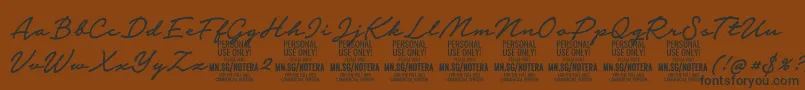 Notera2mediumPersonal Font – Black Fonts on Brown Background