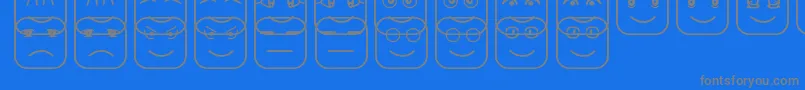 フォントCubeFaceSt – 青い背景に灰色の文字