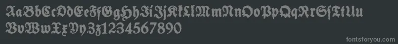 SchneidlerHalbFetteTrashFree-fontti – harmaat kirjasimet mustalla taustalla