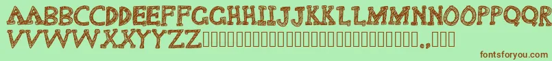 Delusional Font – Brown Fonts on Green Background