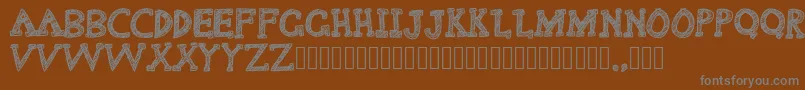Delusional Font – Gray Fonts on Brown Background