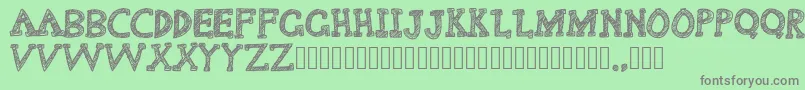 Delusional Font – Gray Fonts on Green Background