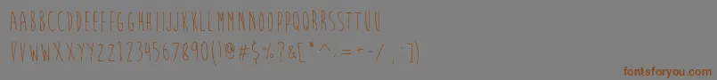 フォントBrainFlowerEuro – 茶色の文字が灰色の背景にあります。