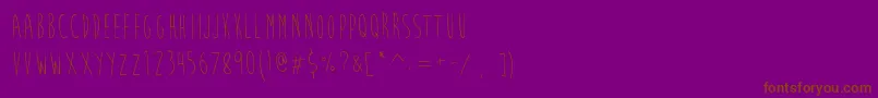 フォントBrainFlowerEuro – 紫色の背景に茶色のフォント