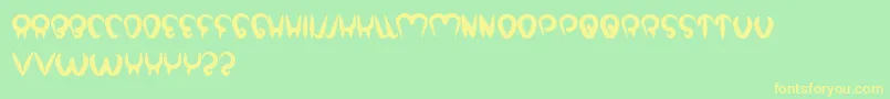 StrongInTheHeart Font – Yellow Fonts on Green Background