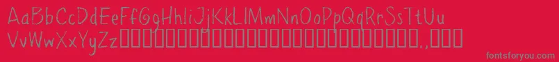 フォントPpetrial – 赤い背景に灰色の文字