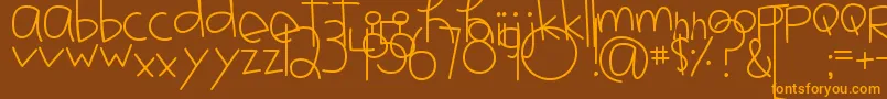 MtfJotted Font – Orange Fonts on Brown Background