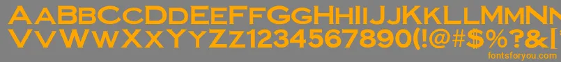 フォントIrronplategothicbold – オレンジの文字は灰色の背景にあります。