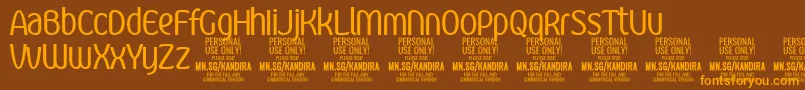 KandiraRegPersonalUse-Schriftart – Orangefarbene Schriften auf braunem Hintergrund