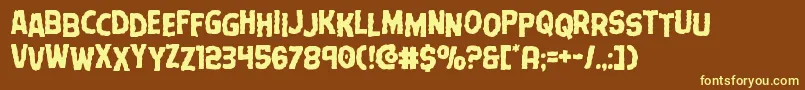 Terrorbabblestag-Schriftart – Gelbe Schriften auf braunem Hintergrund